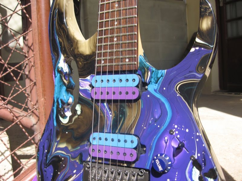 Ibanez RG1527 Prestige purple swirl and bobbin toppers.